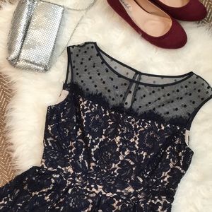 Navy blue lace dress with polka dot illusion neck